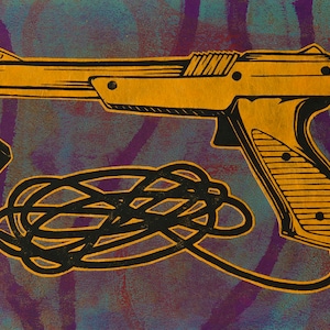 May include: A yellow plastic light gun with a black cord, a common accessory for vintage video game consoles.