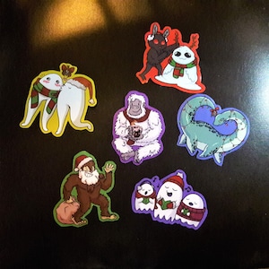 Christmas Cryptid stickers- Holiday Mothman, Nessie, Bigfoot, Ghosts, Fresno Nightcrawlers - Cryptid Vinyl Sticker sheet bundle