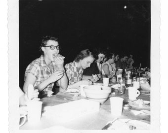 In the Spotlight ~ Vintage Snapshot ~ Woman Eating at the Table with Friends in the Dark ~ Vintage Photo W20