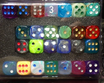 May include: A set of 20 dice in a clear plastic case. The dice are various colors and have different patterns. The dice are numbered 1 through 6. The case has a number 3 on it.