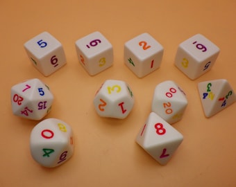 May include: A set of ten white dice with colorful numbers. The dice are in various shapes, including a standard cube, a 12-sided die, and a 20-sided die.