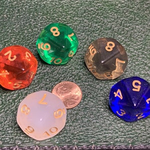 May include: Five ten-sided dice in different colors: red, green, clear, white, and blue. Each die has gold numbers.