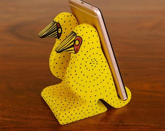 Soporte para teléfono amarillo