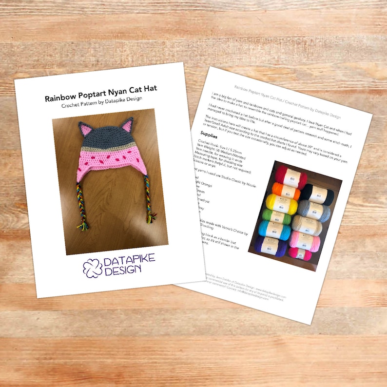 May include: Crochet pattern for a rainbow Poptart Nyan Cat hat. The pattern includes instructions and a list of supplies, including yarn colors. The pattern is by Datapike Design.
