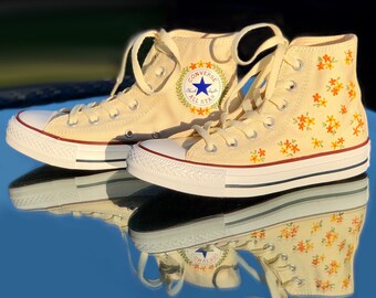 yellow embroidered converse