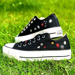 Embroidered black Converse Chuck Taylor all star platform low tops