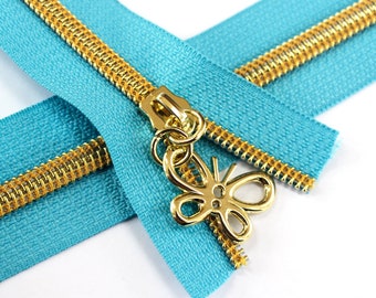 Size #5 Turquoise Zipper with Gold Coil - 5 yards & 15 Regular (Donut) Zipper Pulls