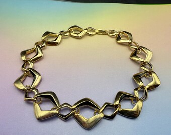 Collier Vintage Chic TED LAPIDUS Motif Cachemire Métal Doré | Bijou Signature Couture Rétro