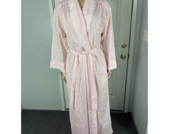 May include: A full-length pink striped robe with white lace trim on the collar and cuffs. The robe has a matching belt and an embroidered design on the chest. The fabric appears to be lightweight.