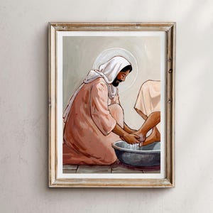 May include: A painting depicting a man kneeling and washing the feet of another person. The man is wearing a pink robe and a white head covering. The scene is set in a room with a tiled floor and a basin of water.