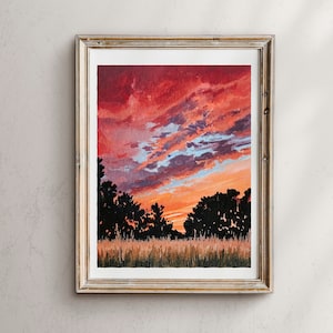 May include: A watercolor painting of a sunset over a field of tall grass. The sky is a vibrant orange and red with streaks of purple and blue clouds. Silhouettes of trees line the horizon.