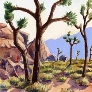 May include: Watercolor painting of a desert landscape featuring Joshua trees, rocks, and scrub brush. The artwork uses a palette of browns, greens, and blues to depict the arid environment. Shadows are cast across the sandy ground.