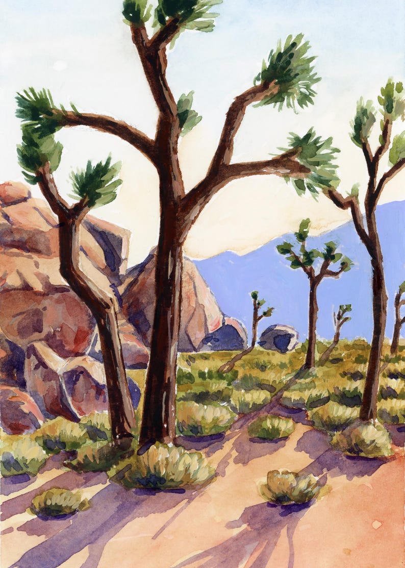 May include: Watercolor painting of a desert landscape featuring Joshua trees, rocks, and scrub brush. The artwork uses a palette of browns, greens, and blues to depict the arid environment. Shadows are cast across the sandy ground.