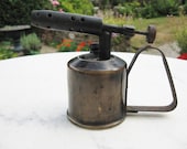 A Rare Vintage French Brass 1 4 Pint Petrol Blowlamp Blow Torch Stamped M L Paris With Large Military Gun On The Front