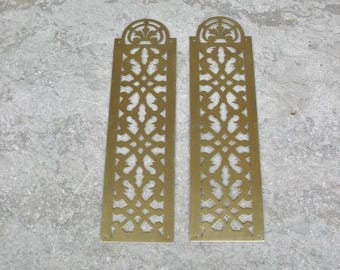 Un par de placas de dedo para puerta de latón francés vintage
