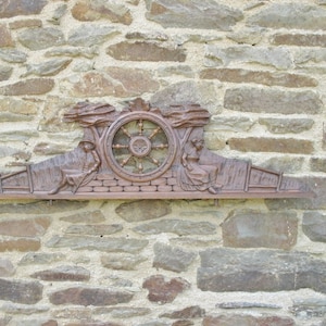 A Really Good Vintage French Folk Art Hand Carved Oak Breton Pediment / Fronton With Breton Man And Woman Sat Either Side Of A Breton Wheel