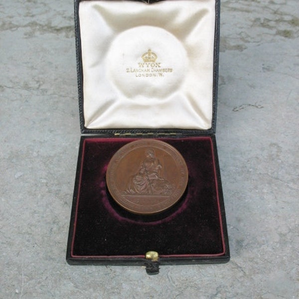 Een Good Boxed Bronze Award-medaille 1910-1911 voor de hoogste vaardigheid in het Duits aan het University College London