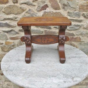A Vintage Hand Carved Oak Stool