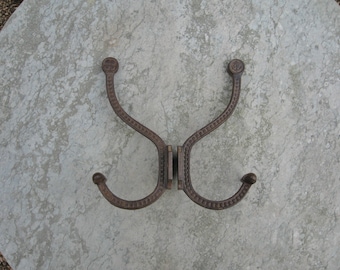 A Good Pair Of French Cast  Iron Coat Hooks Marked C F With Anchor