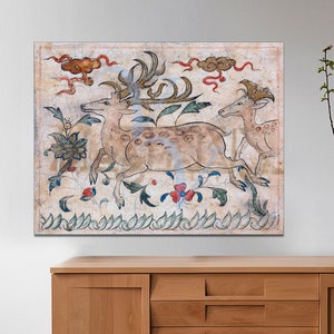 May include: A vintage painting depicting three deer in a forest setting. The deer are painted in shades of brown and white, with intricate details on their antlers and bodies. The background features a lush green forest with red and blue flowers.