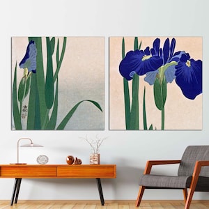 May include: Two square canvas prints featuring a Japanese-style illustration of blue iris flowers with green leaves on a light pink background. The text "青" is visible on the left print.