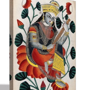 May include: A canvas print of a traditional Indian painting. The artwork depicts a seated figure with blue skin, adorned in ornate clothing, playing a stringed instrument. The figure is seated on a large red lotus flower, surrounded by green foliage.