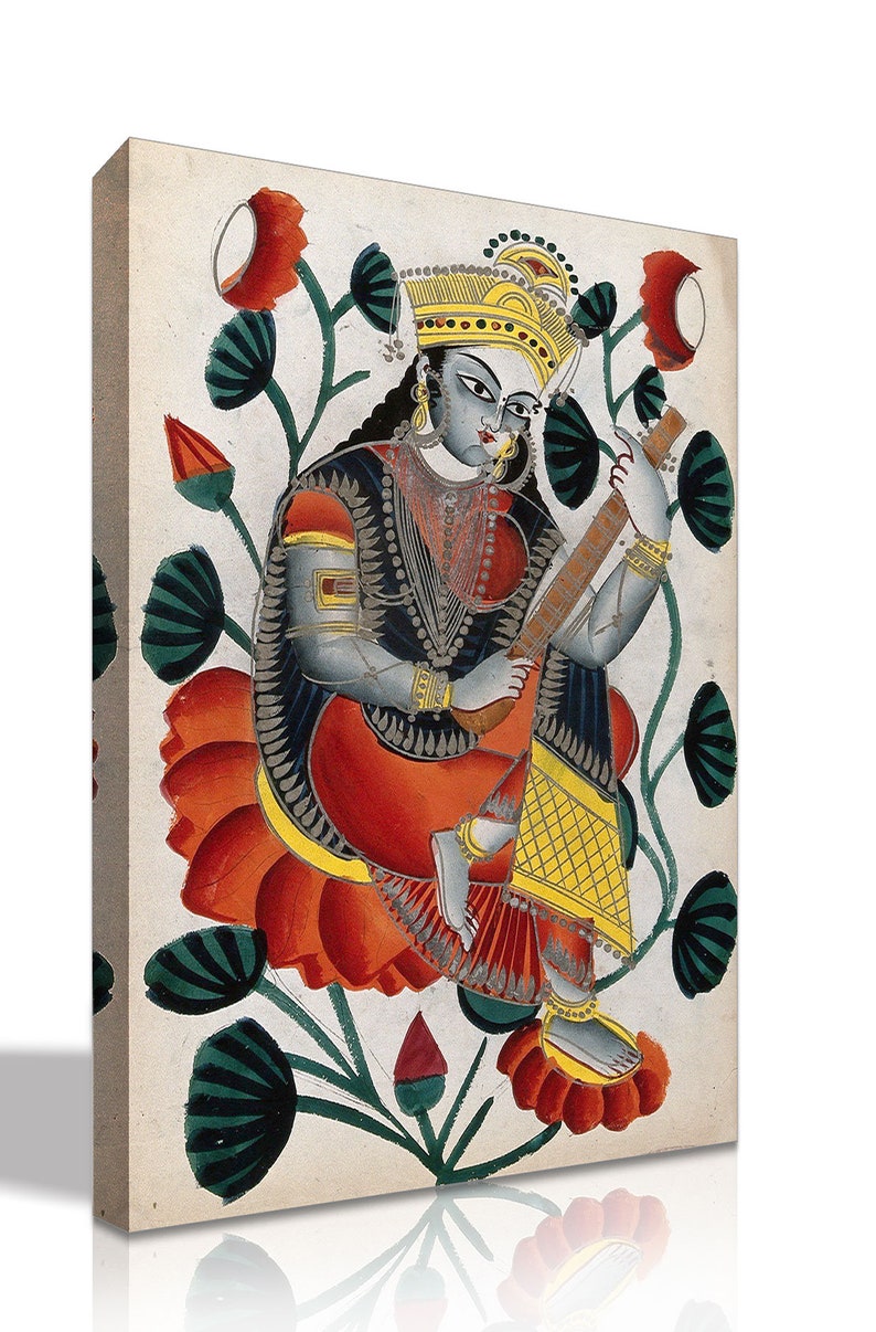 May include: A canvas print of a traditional Indian painting. The artwork depicts a seated figure with blue skin, adorned in ornate clothing, playing a stringed instrument. The figure is seated on a large red lotus flower, surrounded by green foliage.