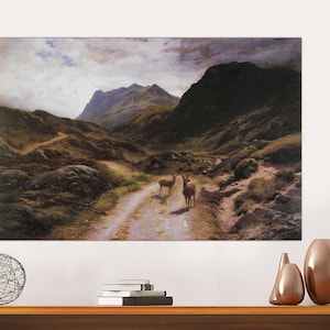May include: A painting of a mountain landscape with two deer in the foreground. The deer are standing on a dirt road that leads into the mountains. The sky is cloudy and the mountains are covered in trees.