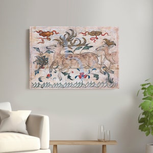 May include: A vintage-style painting depicting three deer running through a field of flowers. The deer are painted in shades of brown and white, with red and blue accents. The background is a light beige with clouds and a green border.