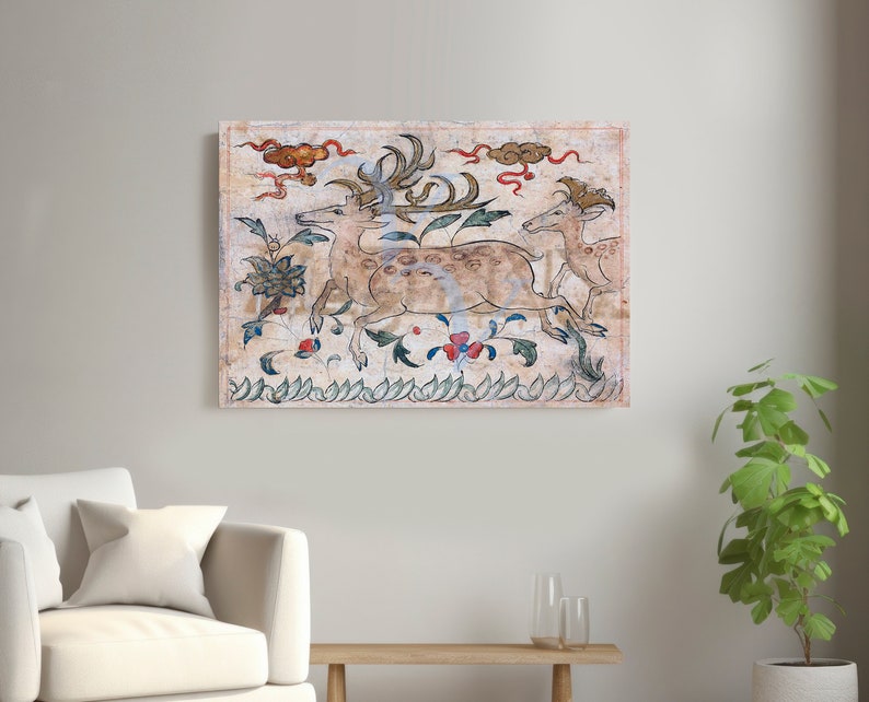 May include: A vintage-style painting depicting three deer running through a field of flowers. The deer are painted in shades of brown and white, with red and blue accents. The background is a light beige with clouds and a green border.