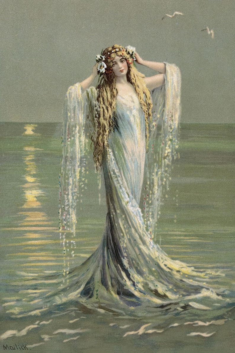 May include: A woman with long blonde hair wearing a white gown with a floral crown stands in the ocean with her arms raised. The water is a light blue-green color and the sky is a light gray. The woman's gown is flowing in the water and her hair is blowing in the wind.