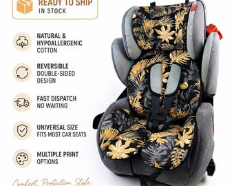 May include: A gray car seat liner featuring a black, gold, and white tropical leaf pattern. The liner includes a headrest section, a back panel, and a seat base with integrated slots for safety harness straps, designed for use in a vehicle car seat.