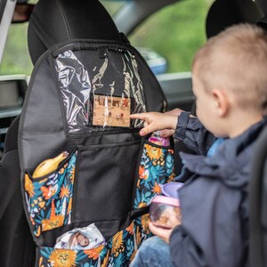 Organizer for the driver's seat with a silicone tablet holder.