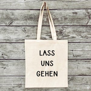 Hand-printed jute bag gym bag feminism saying