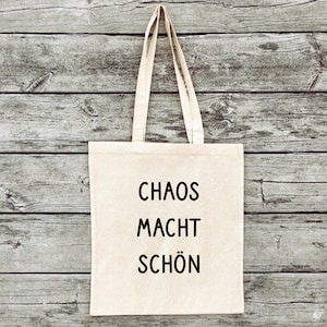 Hand-printed jute bag gym bag feminism saying chaos