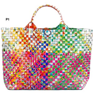 May include: A colorful tote bag with a woven design. The bag features a variety of colors, including pink, green, yellow, and blue. It has two handles and a button closure. The bag is made of a durable material and is suitable for carrying various items.
