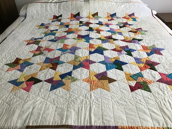 Beautiful, machine pieced, machine quilted, stunning star themed/ butterfly backed, 62 1/2” x 70” quilt