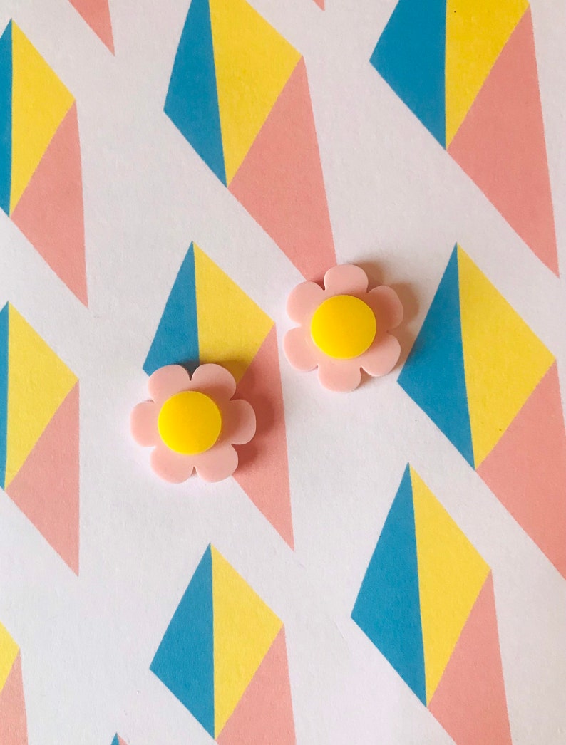 cute laser cut pastel pink acrylic flower earrings. YOU GROW GIRL