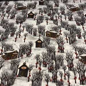May include: Fabric with a winter scene featuring brown cabins, leafless trees, and red buckets. The cabins have signs and are surrounded by snow. The trees are tall and thin, with red buckets hanging from them. The background is white.
