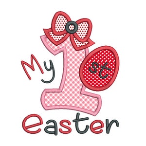 May include: Pink and red embroidered design with a gingham pattern, a bow, and an egg. The design says "My 1st Easter".