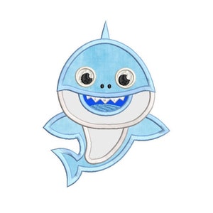 May include: A blue and white cartoon shark with a toothy grin and big eyes. The shark is in a swimming pose with its tail and fins outstretched.