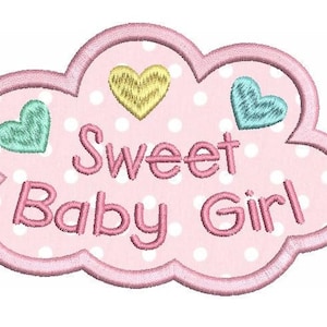 May include: Pink cloud-shaped embroidery design with white polka dots and the text "Sweet Baby Girl" in pink. There are three hearts in different colors: yellow, green, and blue.