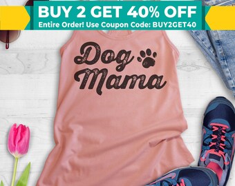 May include: A pink tank top with the text "Dog Mama" in black with a paw print. The text has a distressed look.