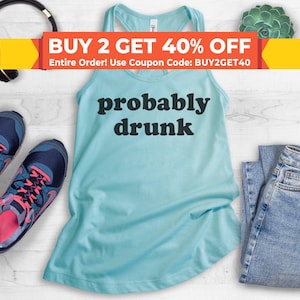 May include: A light blue tank top with the text "probably drunk" in black letters.