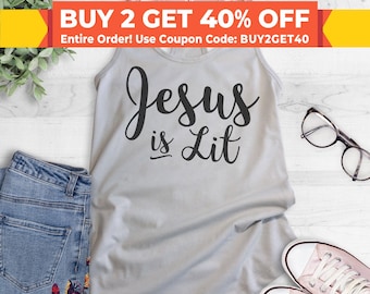 May include: A gray tank top with the text "Jesus is Lit" in black cursive lettering.
