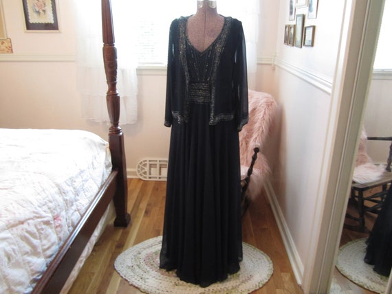 Elegant beaded dress and jacket in navy blue