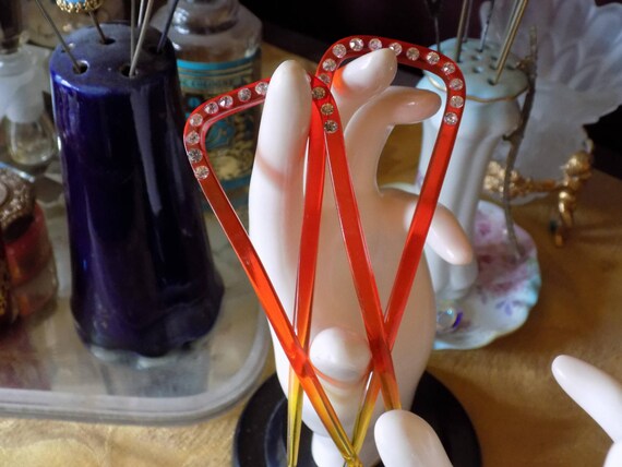 Fun orange Lucite rhinestone set of hairpins.