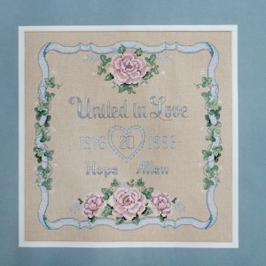 Sunset #13587 &quot;ROSE ANNIVERSARY RECORD&quot; Counted Cross Stitch  -1994 - Framed Size  11&quot; x 11&quot; w/o mat, 15&quot; x 15&quot; With Mat As Shown