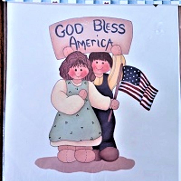 Ragamuffins "GOD BLESS AMERICA"   Iron-On Transfer Features a Boy, Girl Dolls and  the American Flag - Diy T-Shirt or Sweatshirt