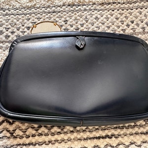 Vintage 1950s navy blue leather clutch